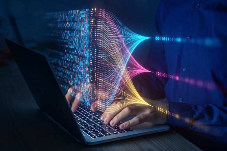 Scientist computing, analysing and visualizing complex data set on computer.